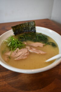 Shio ramen with chicken chashu and clear broth at Fou Fow Ramen Amsterdam
