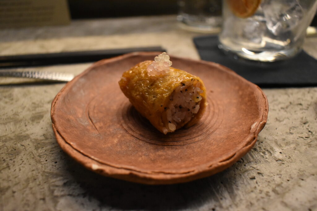 Inari amuse-bouche with salmon roe at Fuku Ramen Amsterdam dinner course