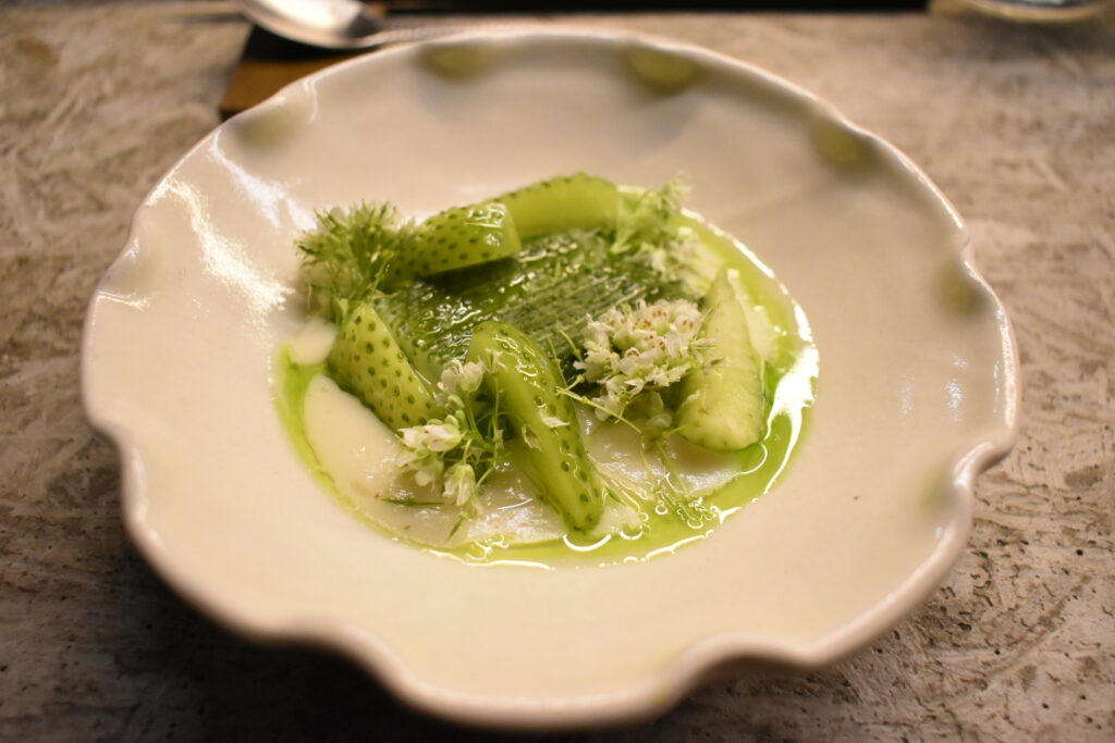 Ika course at Fuku Ramen — squid with unripe green strawberries and edible flowers in green sauce