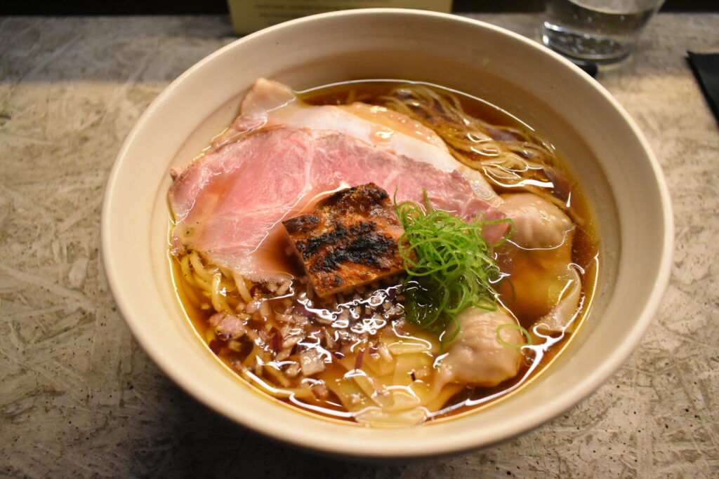 Shoyu ramen with three kinds of chashu, binchotan-grilled chicken and wonton at Fuku Ramen Amsterdam