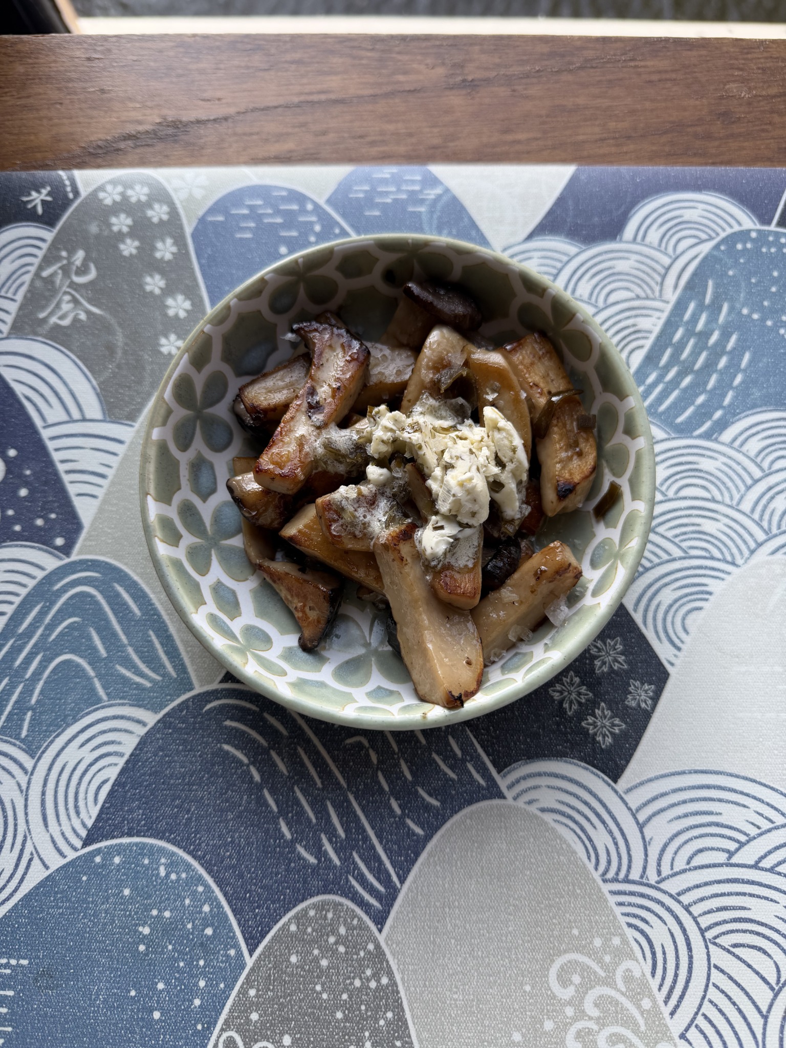 Eringi king oyster mushrooms topped with kombu butter at Vatten Ramen Amsterdam