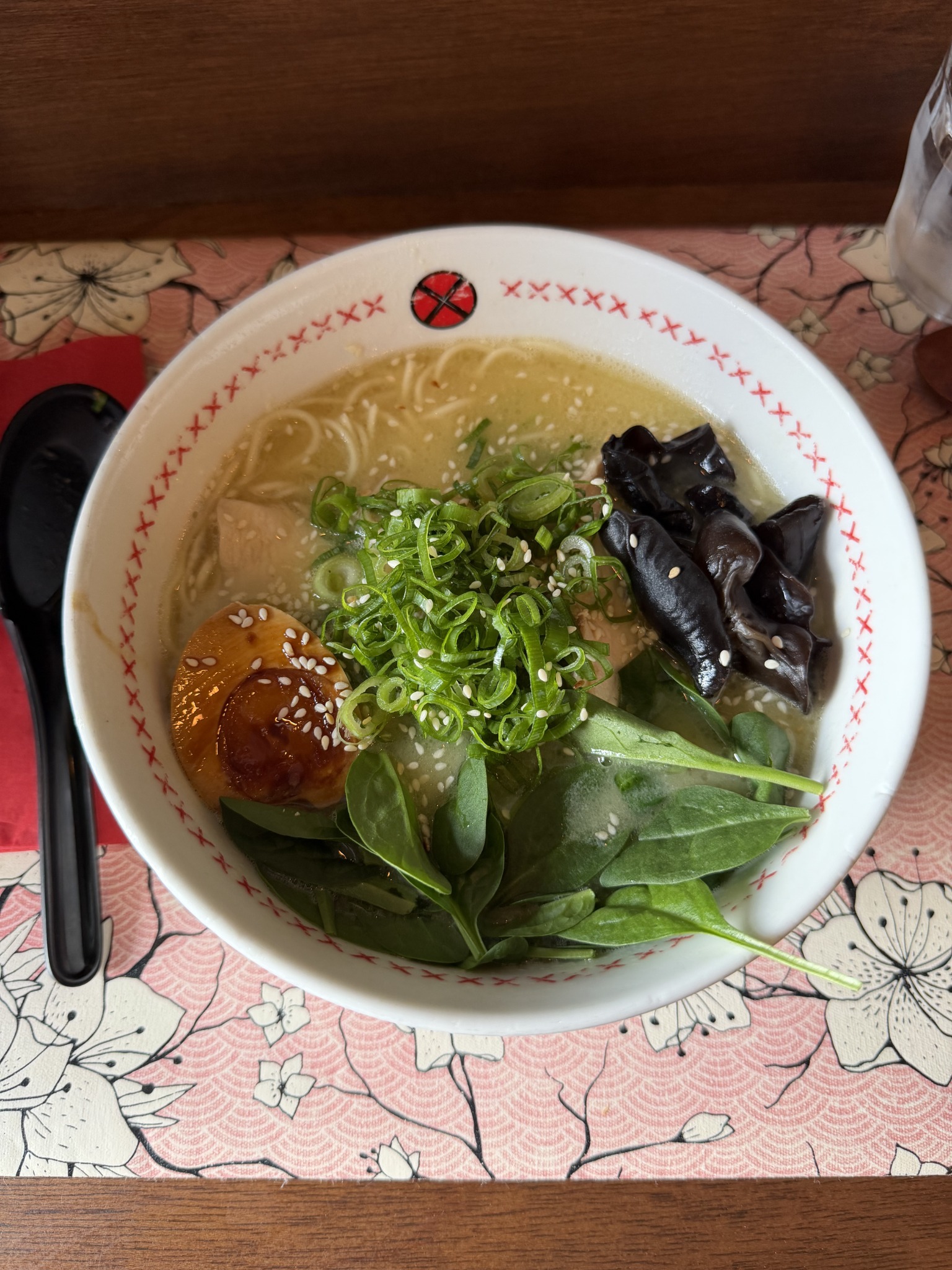 Vatten Ramen chicken paitan with homemade noodles, chicken, seasoned egg, spring onions, spinach and kikurage
